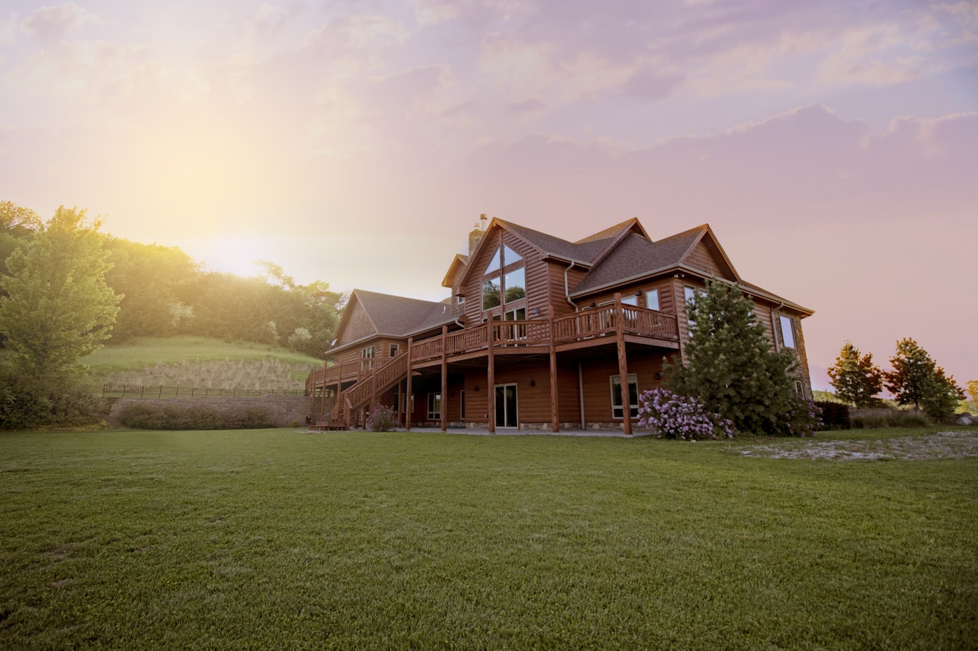 A property on open land at sunset